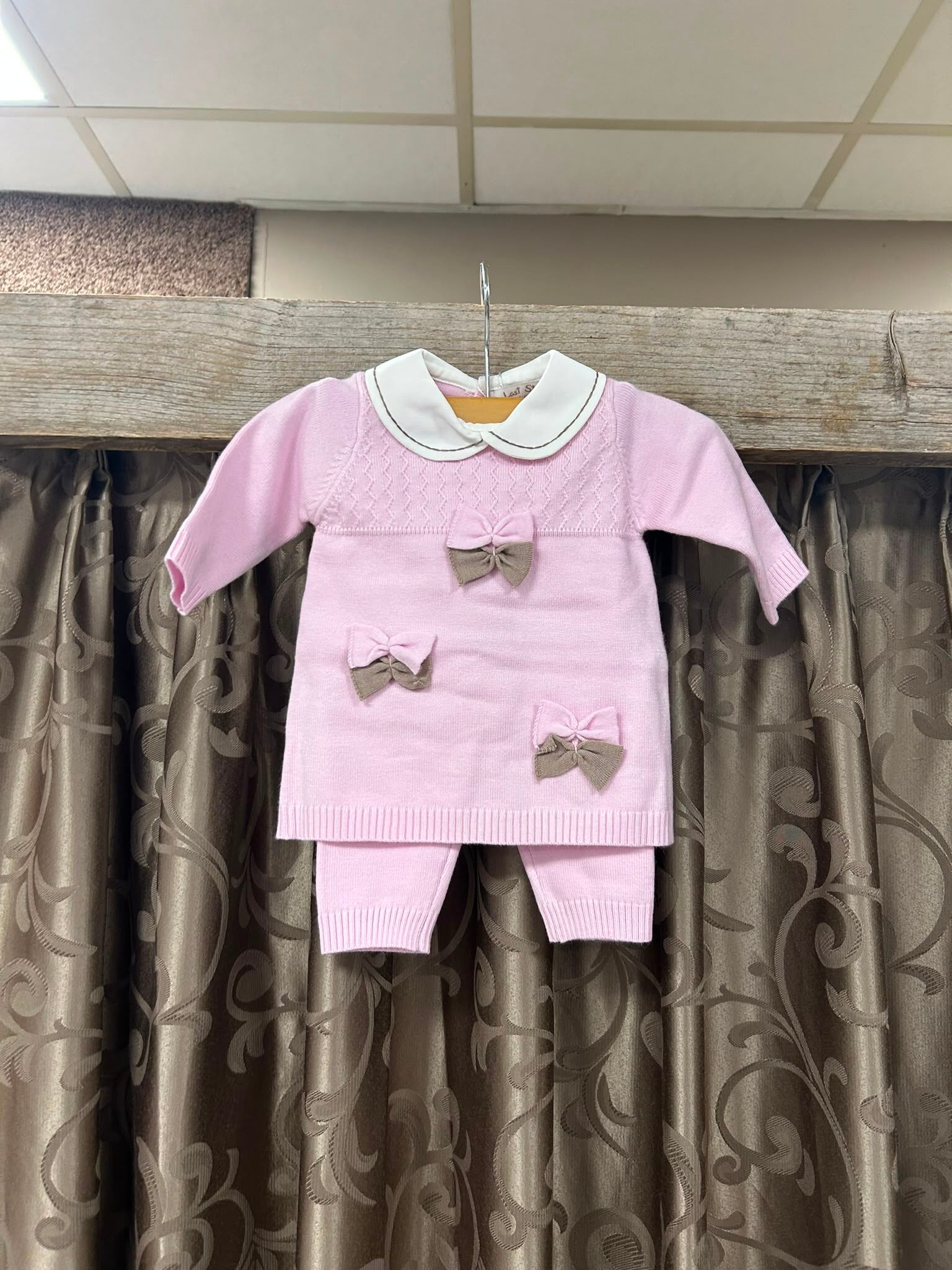 Baby pak met strikjes roze