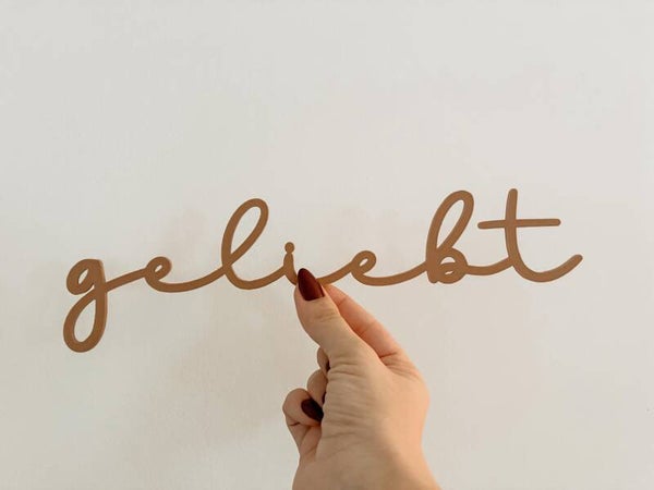 Schriftzug "geliebt"