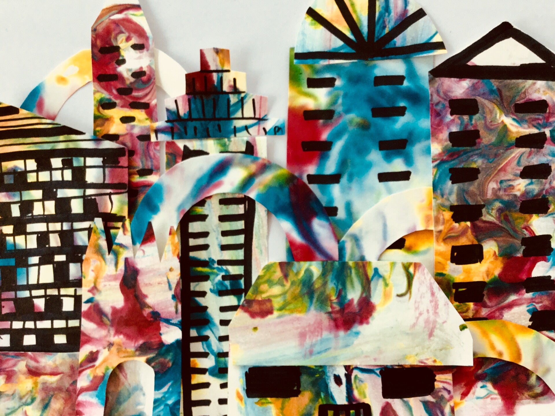 Upcycle. Colourful collage made from cut up doodles and unfinished art work. Collage of Singapore skyline. 