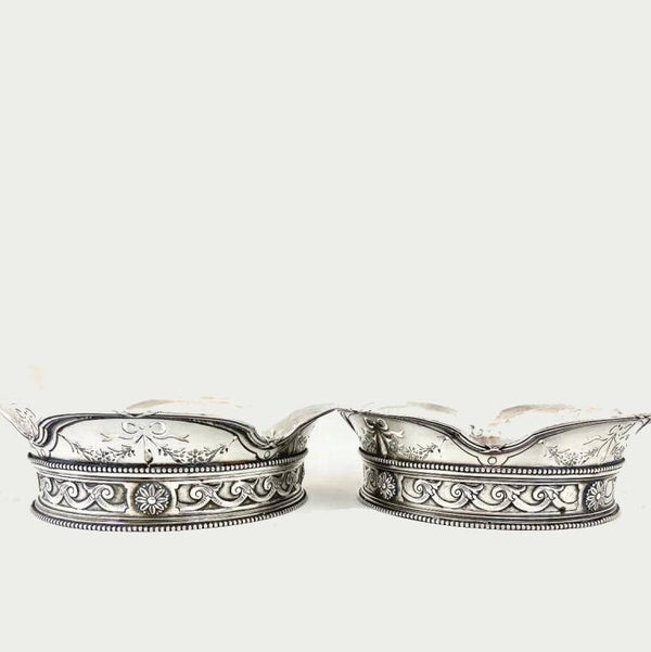 Pair of pierced wine coasters, Belgium around 1900, Louis XVI style, sterling silver,