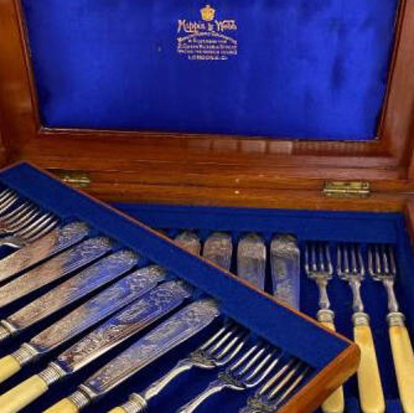 Victorian set of 12 fish forks and knives. Silver-plated and ivory