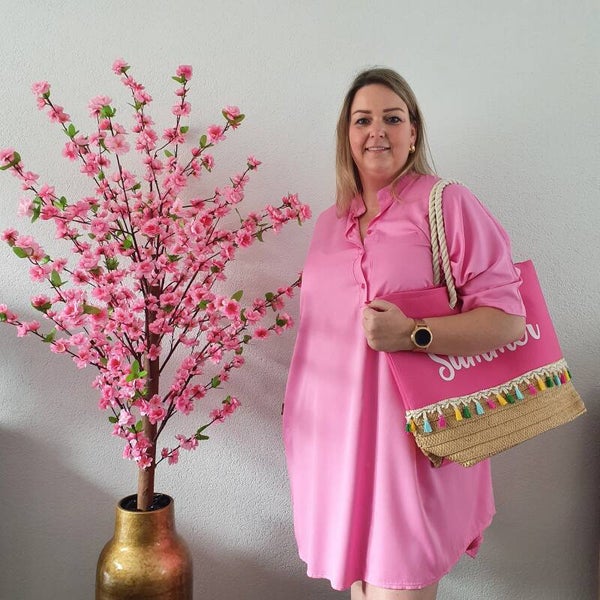 Tuniek Roze met knoopjes en steekzakken