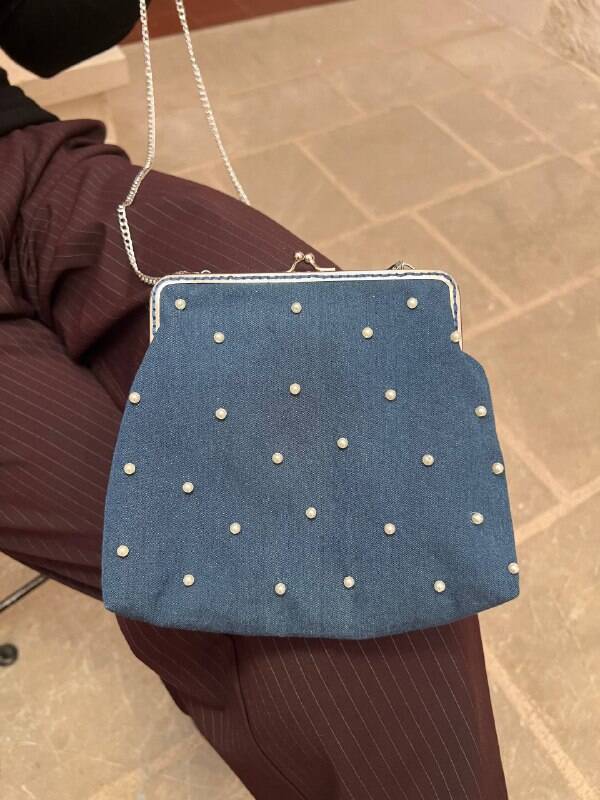 Robertina con le perle