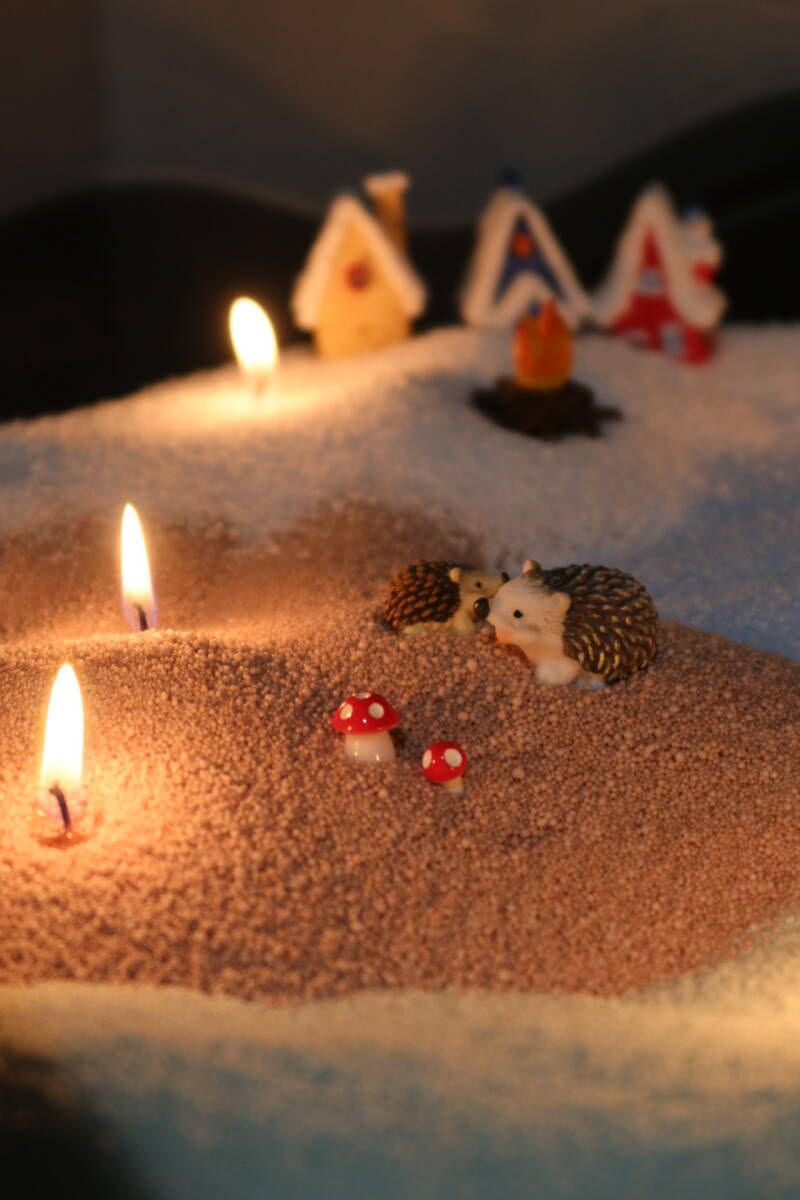 kaarsenzand decoratie met verschillende kleuren