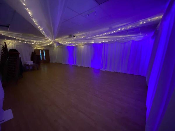 Ceiling drapes with fairy lights +starlight entrance drapes