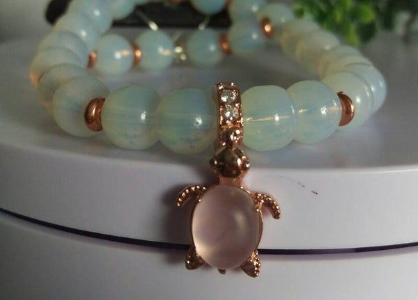 Opal beaded bracelet with sterling silver rose gold turtle charm