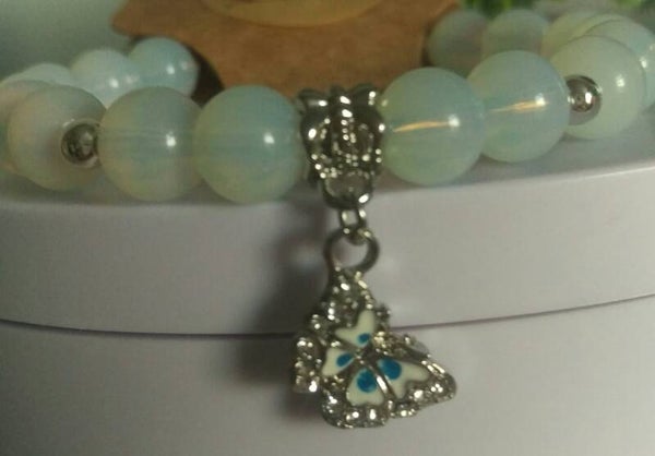 Opal beaded bracelet with blue and white sterling silver butterfly charm