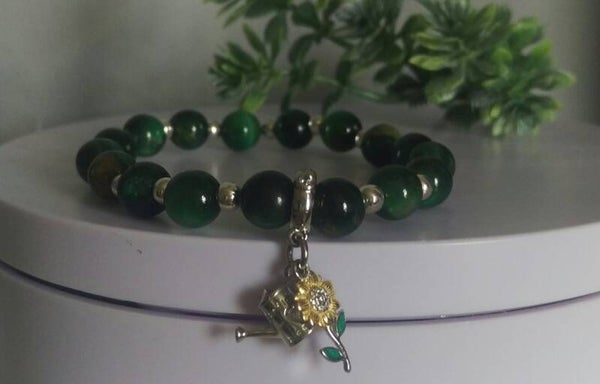 Green tigers eye with sterling silver sunflower & watering can charm