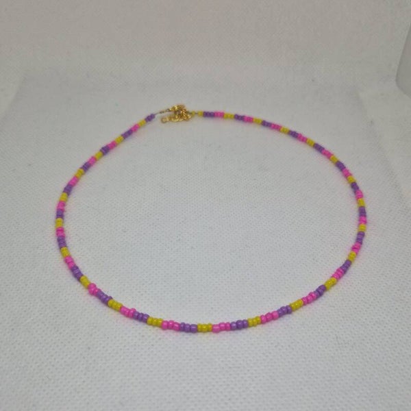 Ketting geel, paars en roze