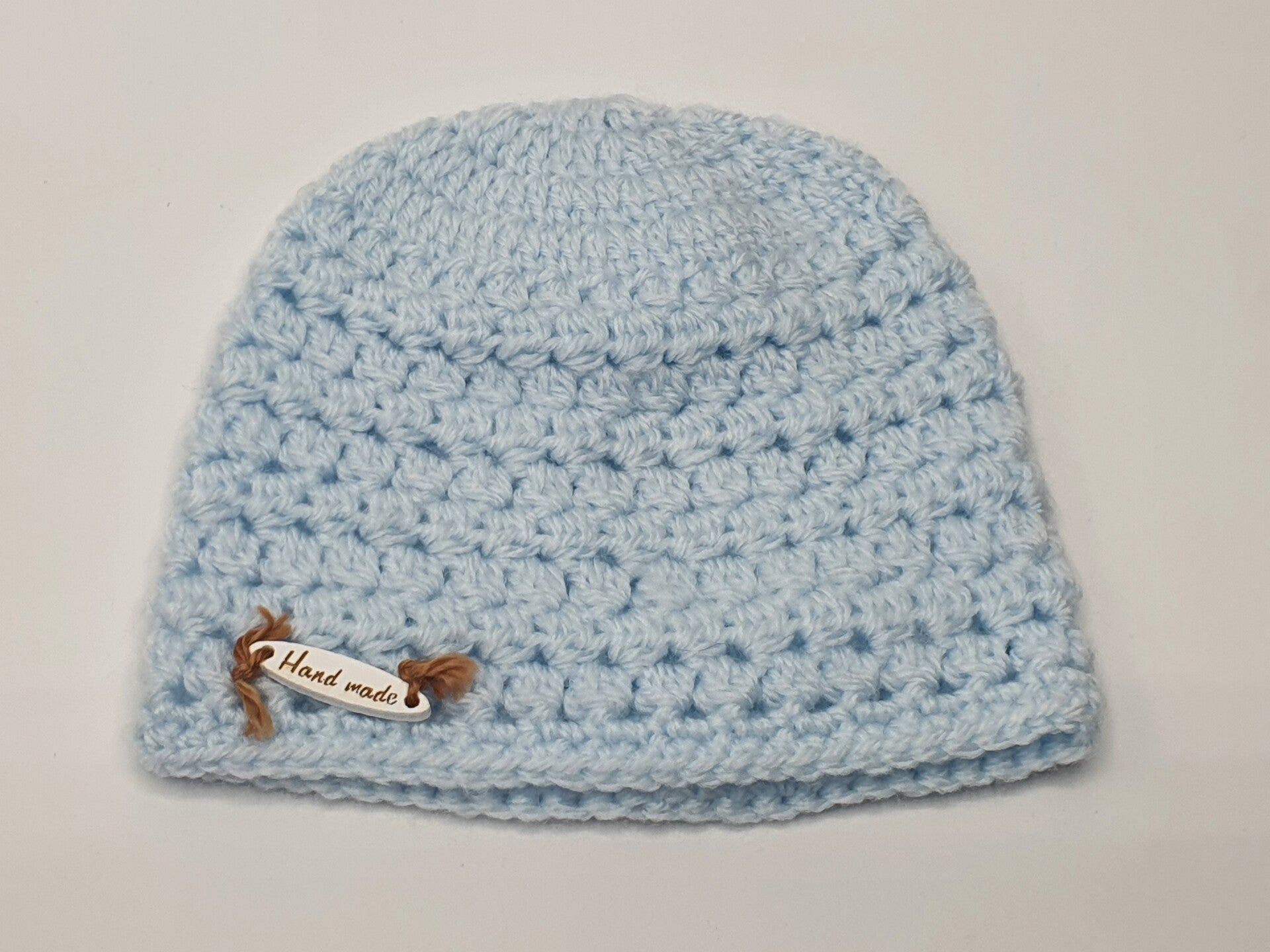 Pluisje Poppenmutsje