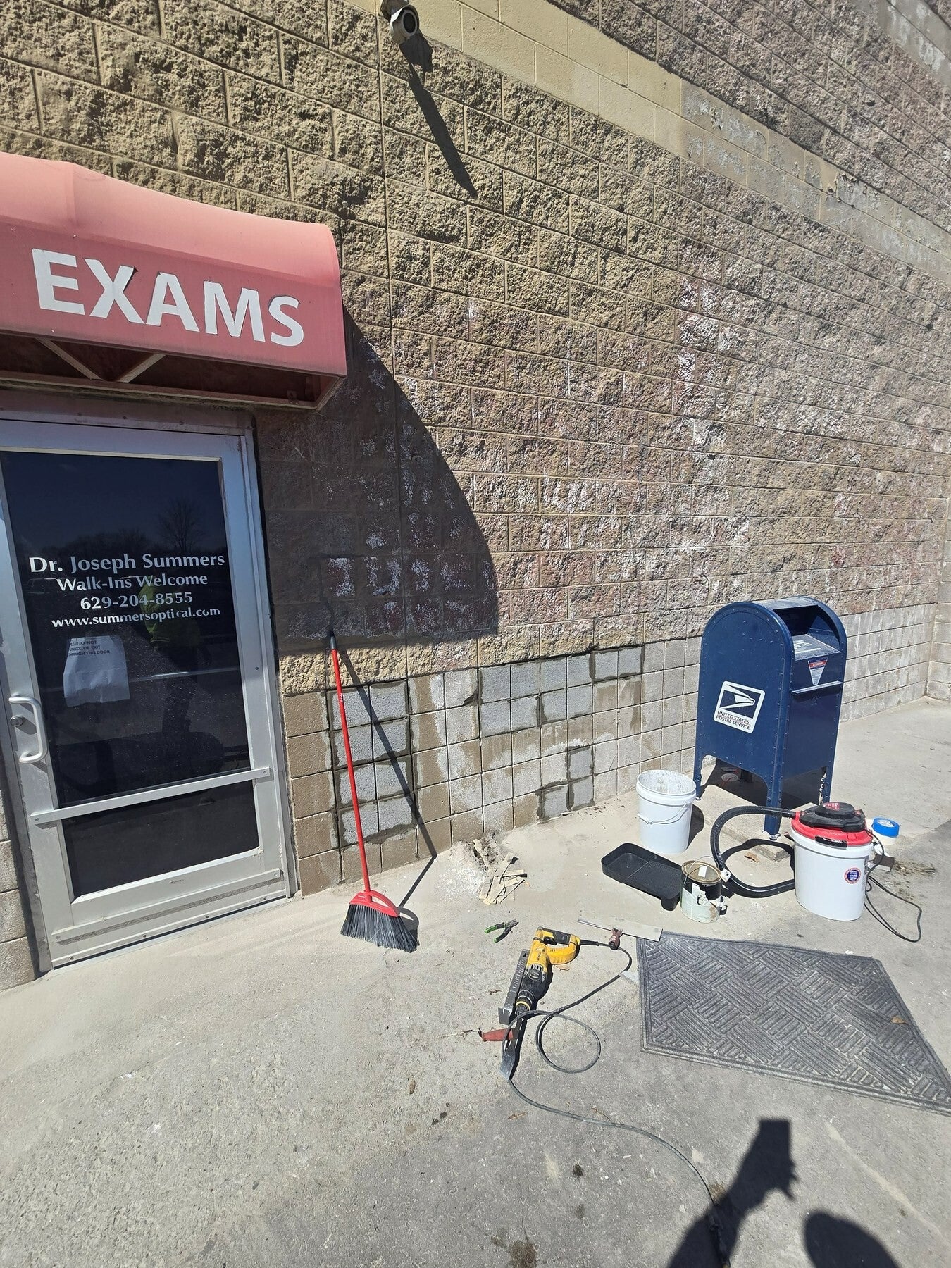 CMU block wall repair and masonry patching at a commercial property