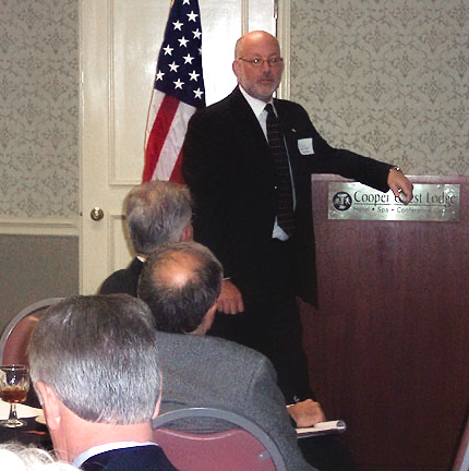 Mark R. Haas speaking to Dallas executives