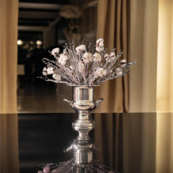 The Silver Toast (Oneida) — Vintage silver‑plated champagne cooler reimagined as a curated centerpiece.