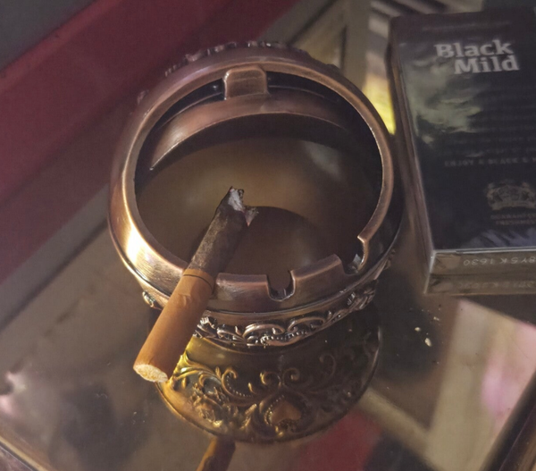 Metal sphere ashtray