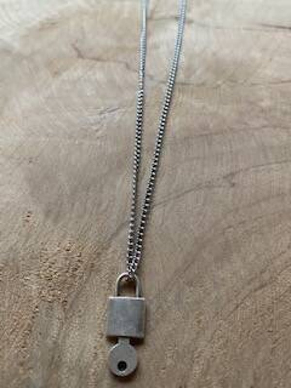 slot met sleutel ketting