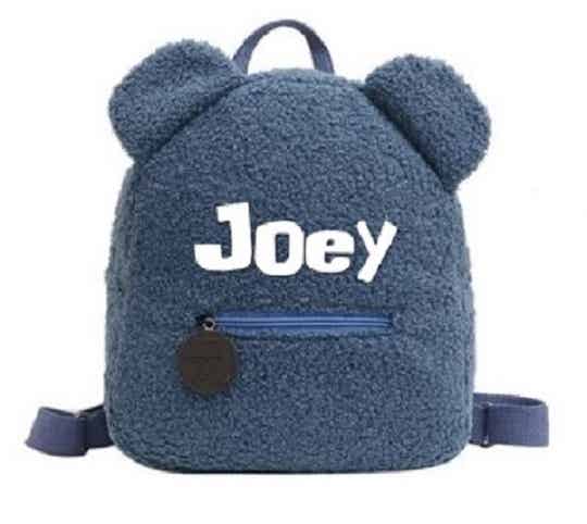 Teddy Rugtas met naam Blauw