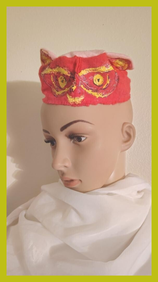 A unisex child original owl hat size is 17 inches around the crown and is three inches tall