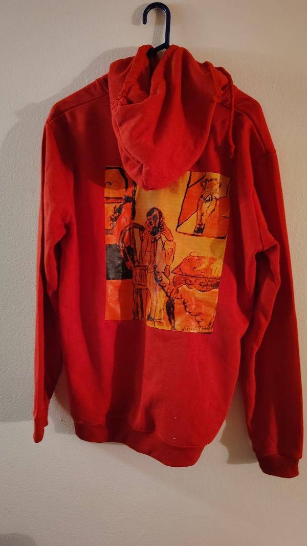Men Red Jersey size X Large Has artist iron artwork on the back has a hoodie.