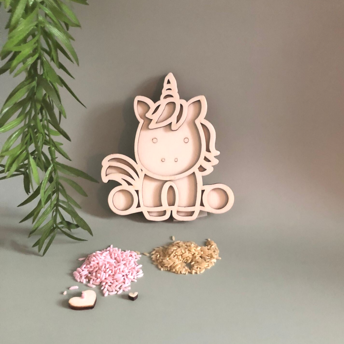 Speelframe eenhoorn zittend