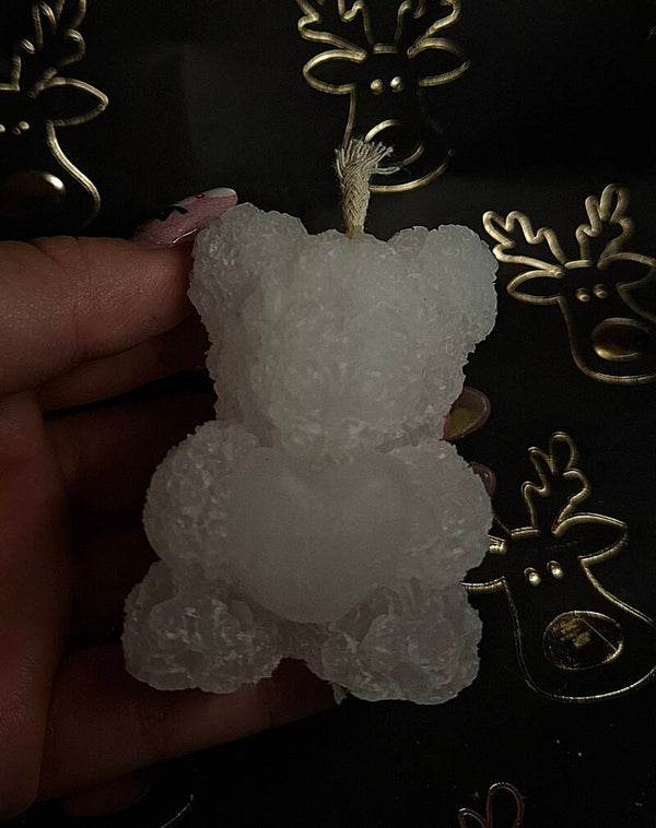 Teddybär-kerze mit einem Herz