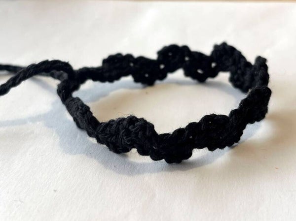 Black armbandje Wave