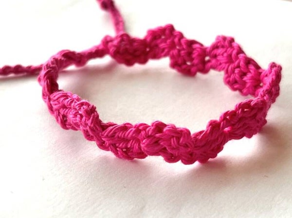 Fushia armbandje Wave