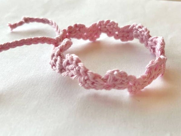 Rosa armbandje Wave