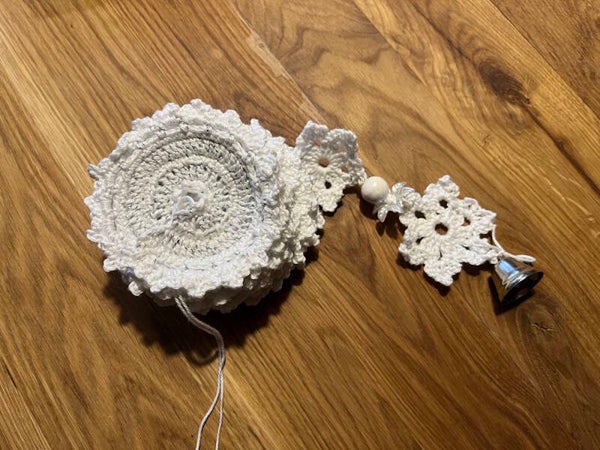 Windspinner Sneeuwvlok zilverdraad/ windspinner Snow flake silver.