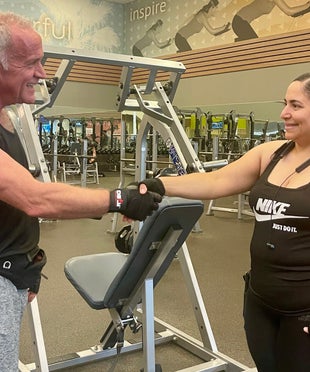coach Paul greeting client