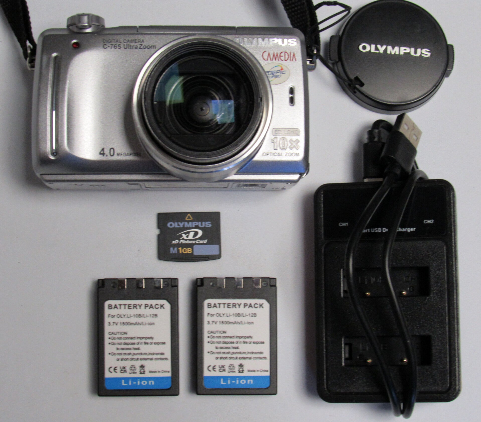 OLYMPUS CAMEDIA C-765 ULTRA ZOOM  DIGITAL CAMERA 4 .0 MEGAPIXELS ZOOM OPTIQUE 10x ZOOM DIGITAL 40x.