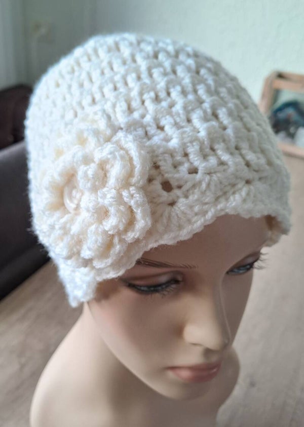 Muts roomwit met bloem