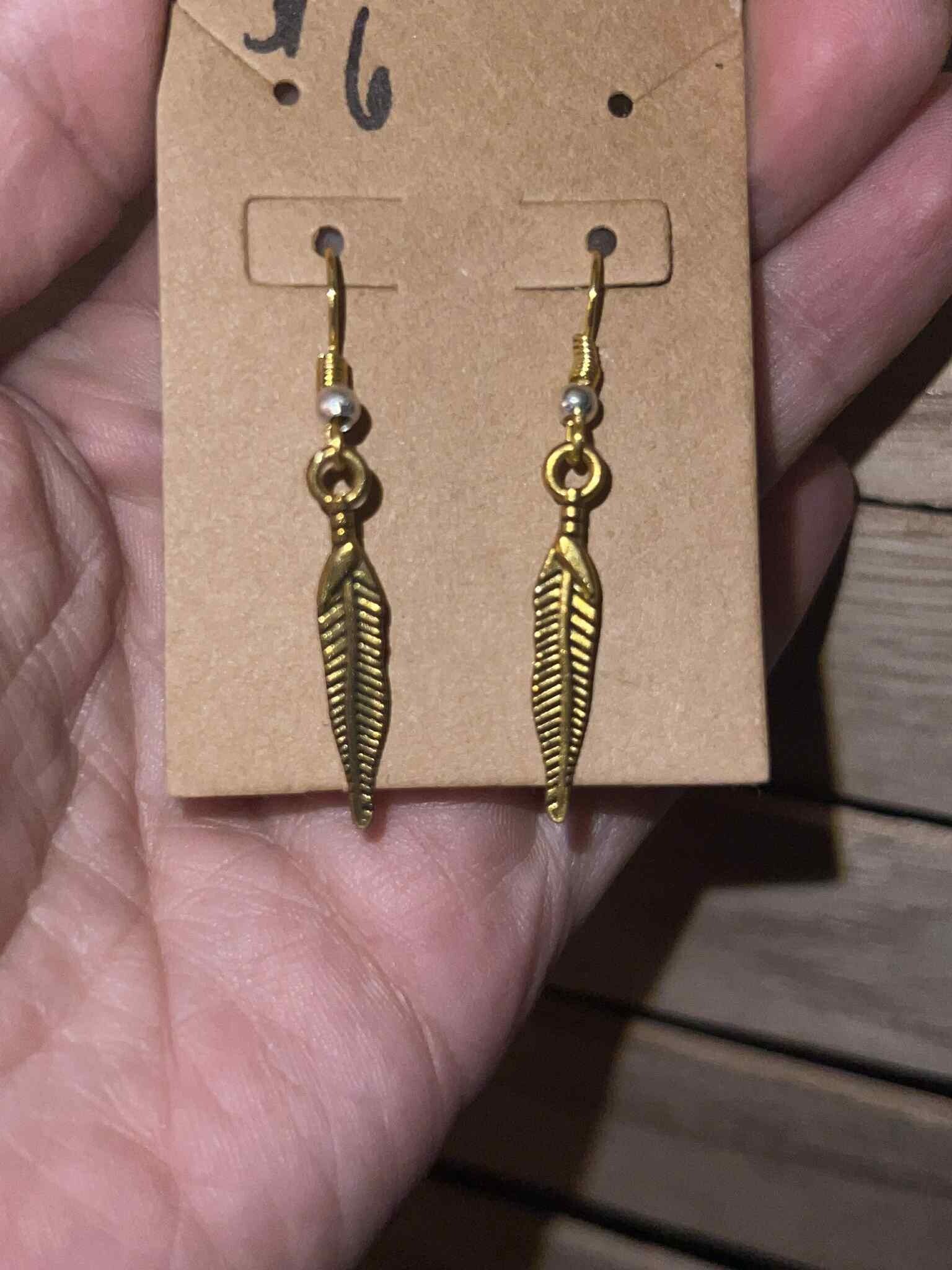 Gold metal feather earrings