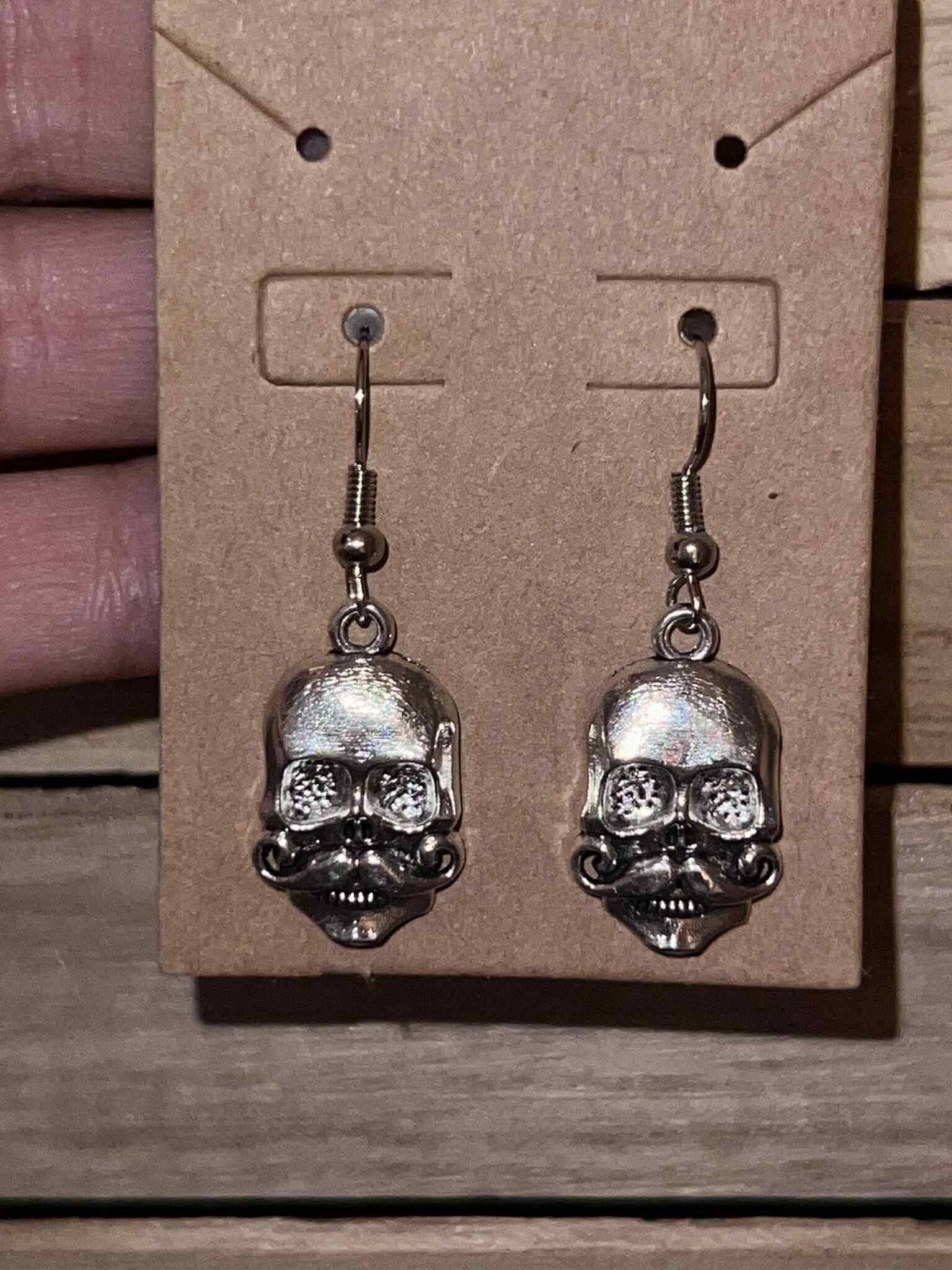 skull head with mustache earrings