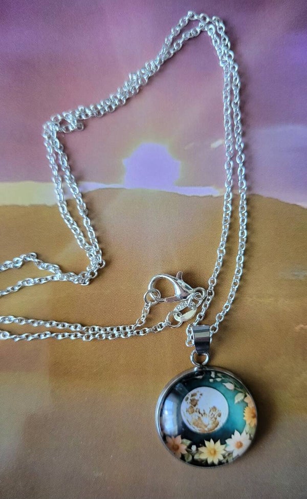 Moon shining through a window charm