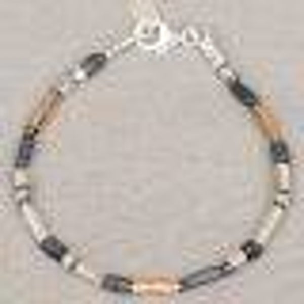 21755 Jeh Jewels Armband Tubes Duo zilver OX + Goldfilled + Hematiet Power