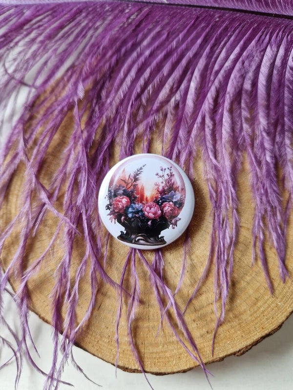 Badge boule de cristal fleurie,