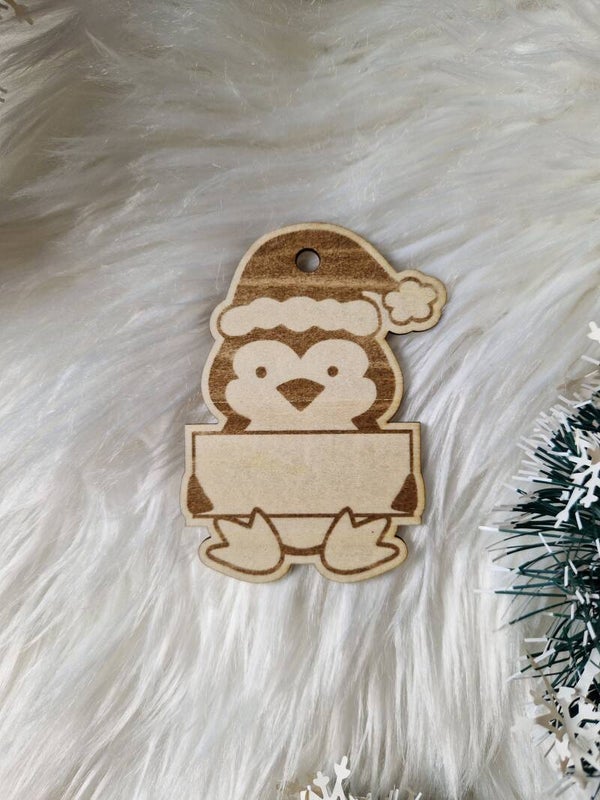 Décoration de sapin en bois pingouin
