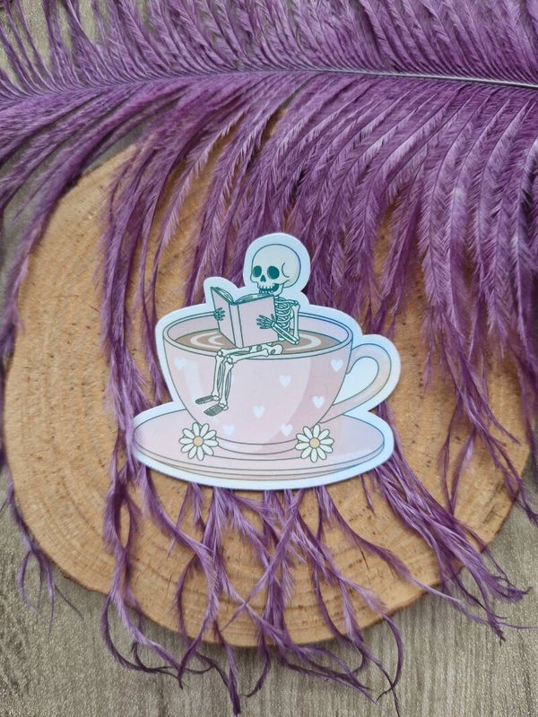 Sticker holographique thé et squelette qui lit,