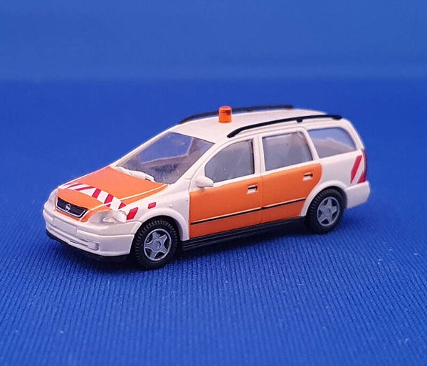 Wiking - Opel Astra Caravan met zwaailicht (1642)