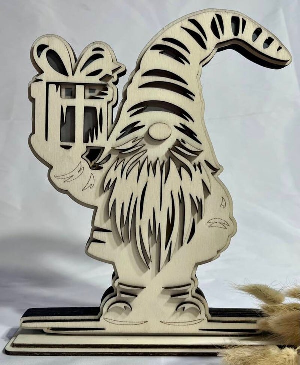 Wichtel mit Geschenk