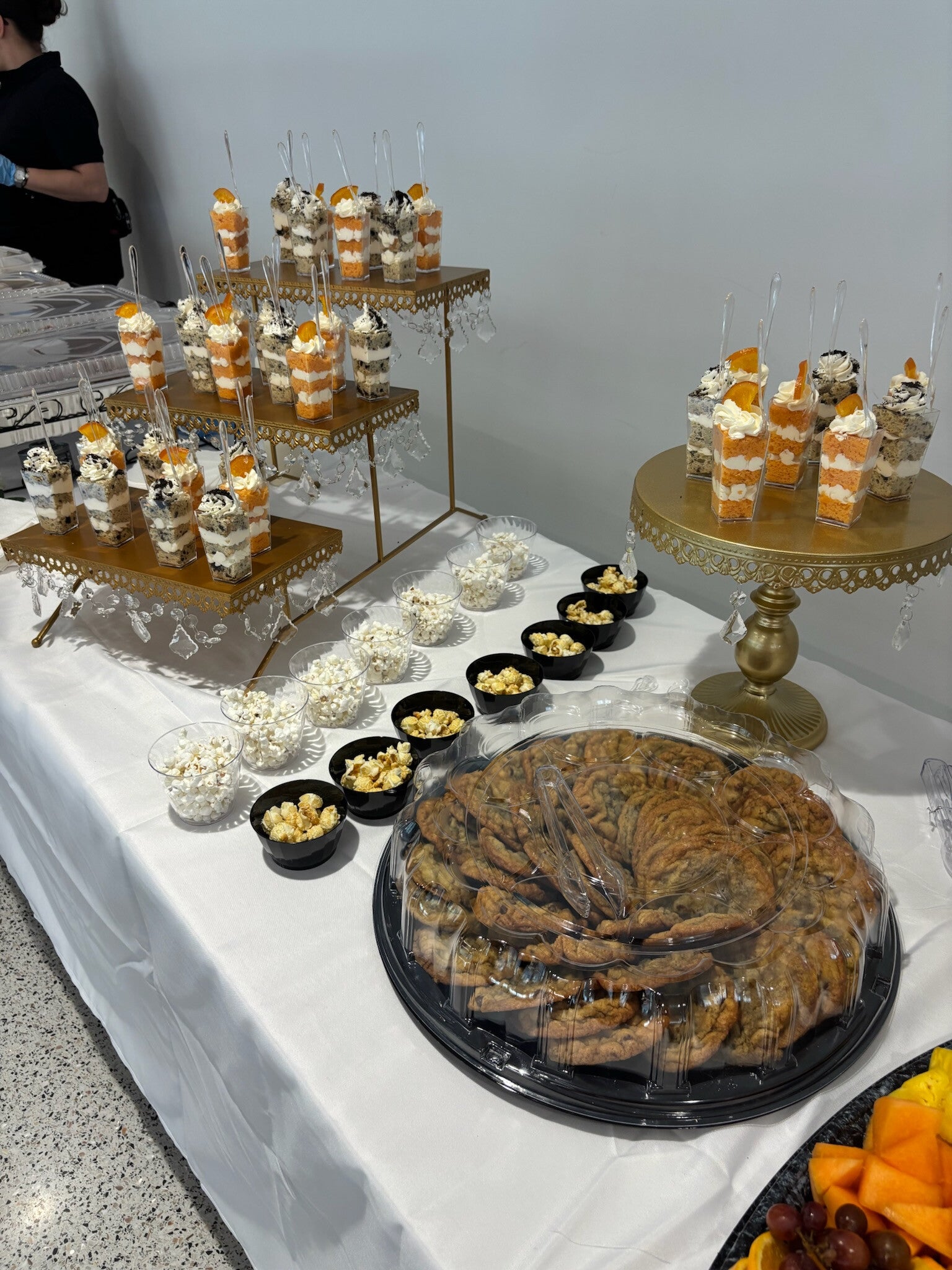 oreo and orange creamsicle cake shooters and and platter of chocolate chip cookies