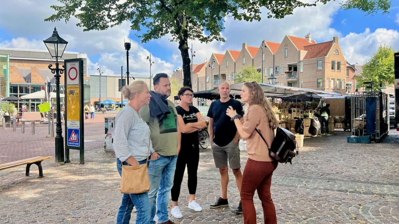 Walking tour in Alkmaar including the cheese market and medieval streets.