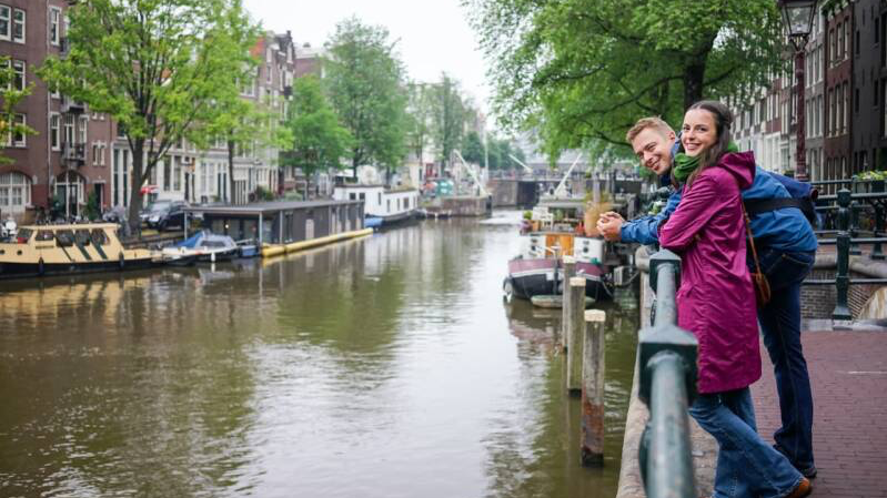 Walking tour in Amsterdam’s Jordaan neighborhood with hidden courtyards and local stories.