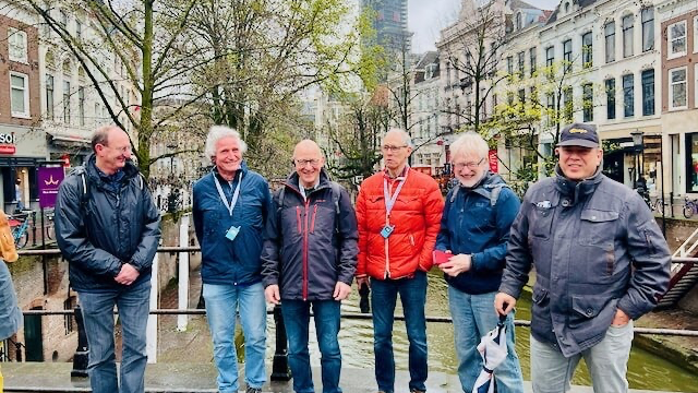Small group walking through Utrecht’s old city center with a local guide.
