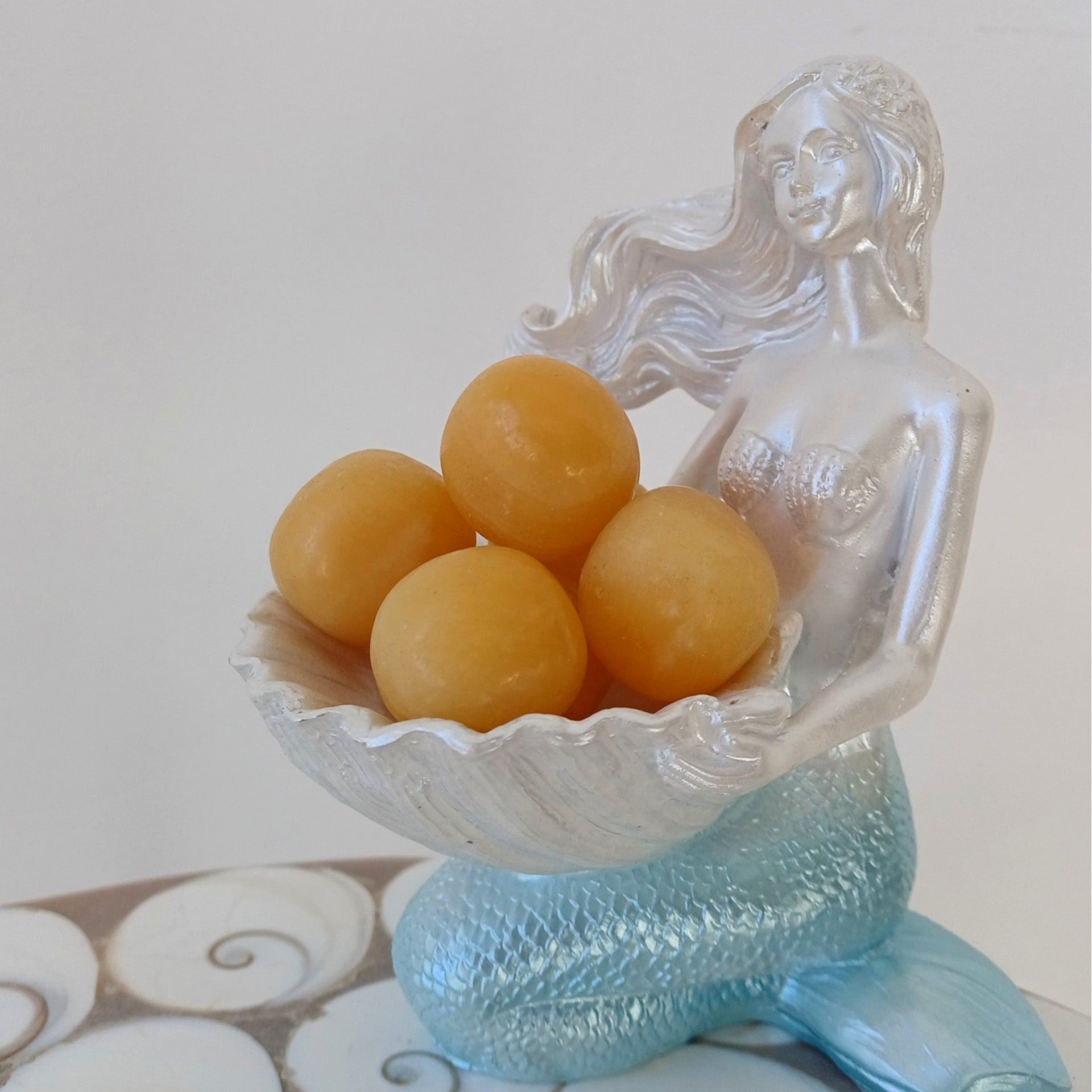 Oranje calciet knuffelsteen