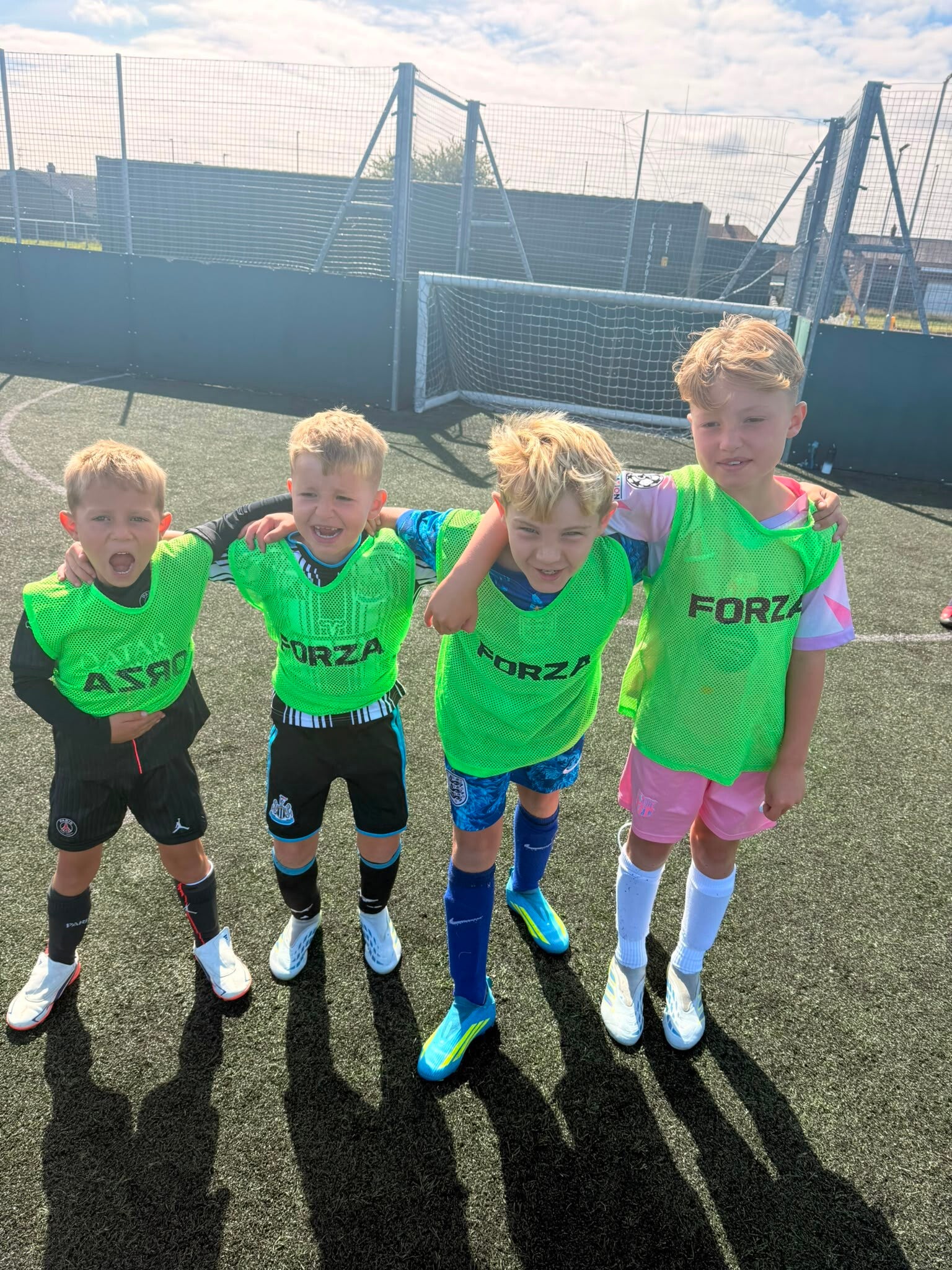 "Children playing football at a DJR holiday football camp"