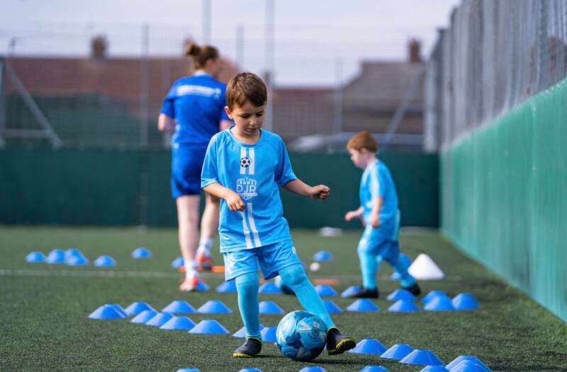 "Children taking part in a Tiny Tacklers football session at Forest Hall YPC"