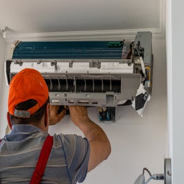 vecteezy_installing-an-air-conditioner-in-an-apartment-office-lviv_46481548-standard-6n6svq.jpg