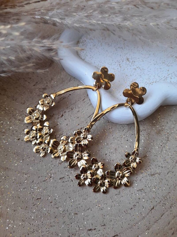 Boucles fleurs acier inox