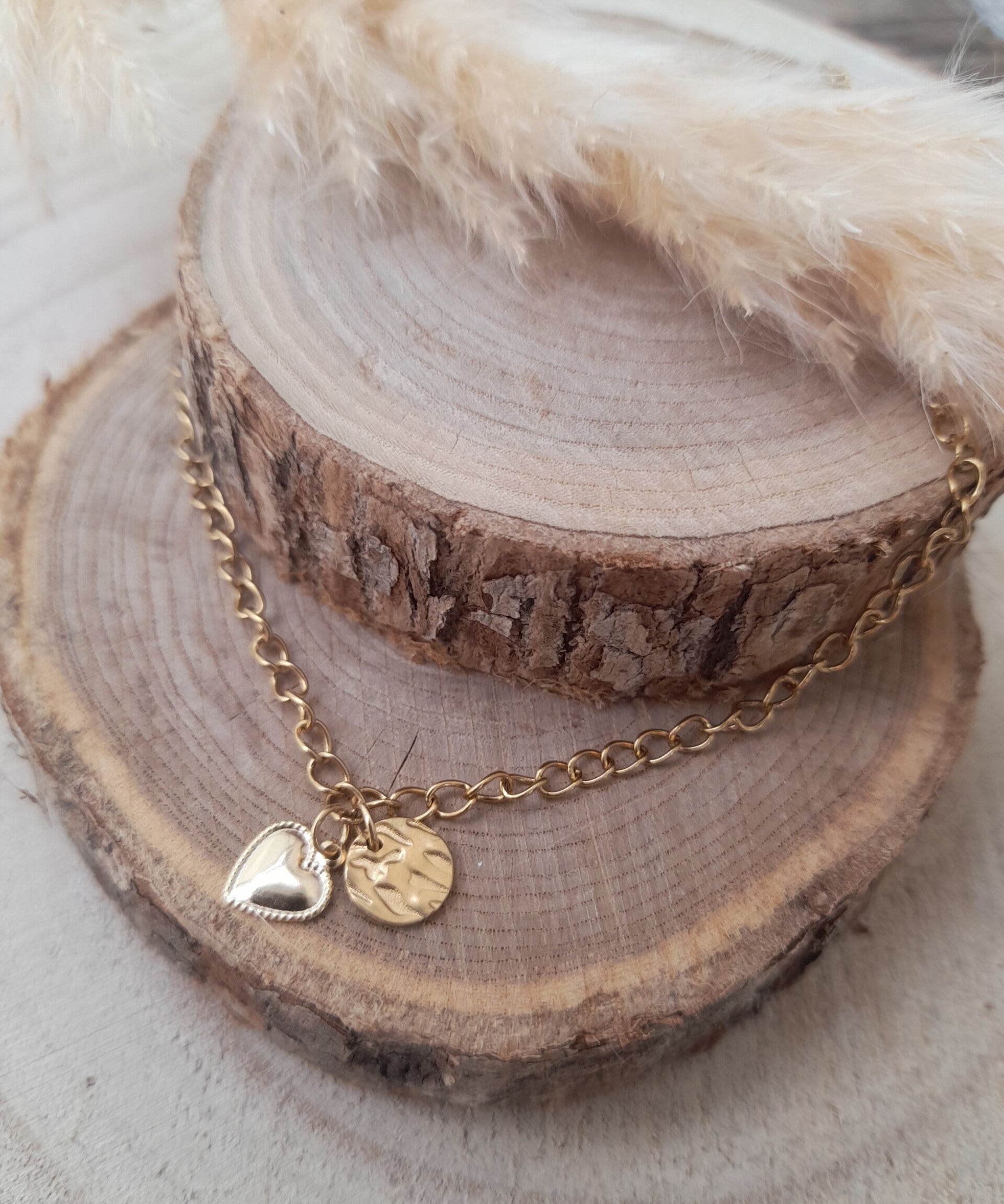 Collier ajourée avec pampille inox